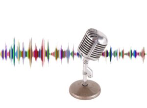 microphone in front of multicolored sound waves